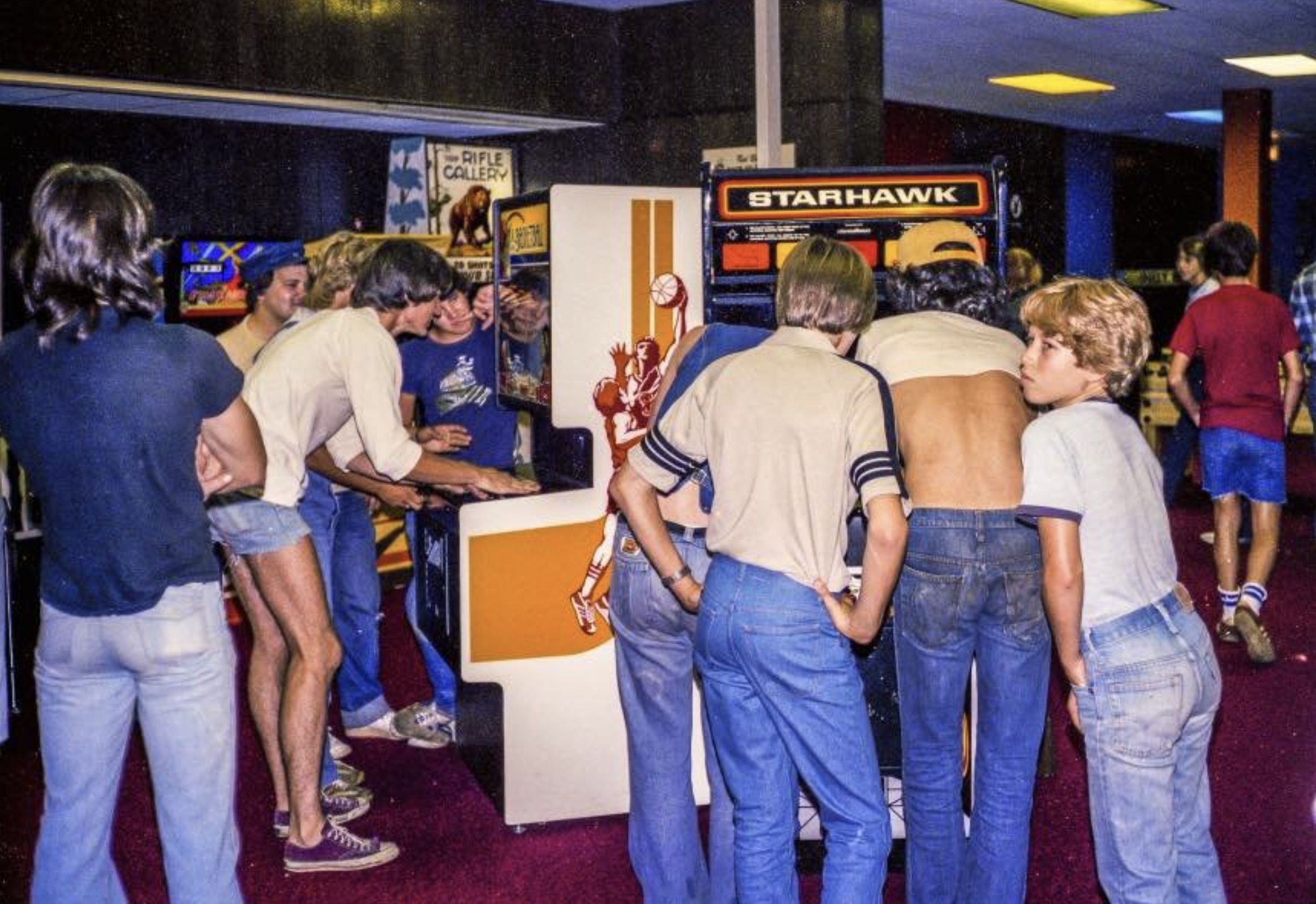 A crowded video arcade in 1980 
